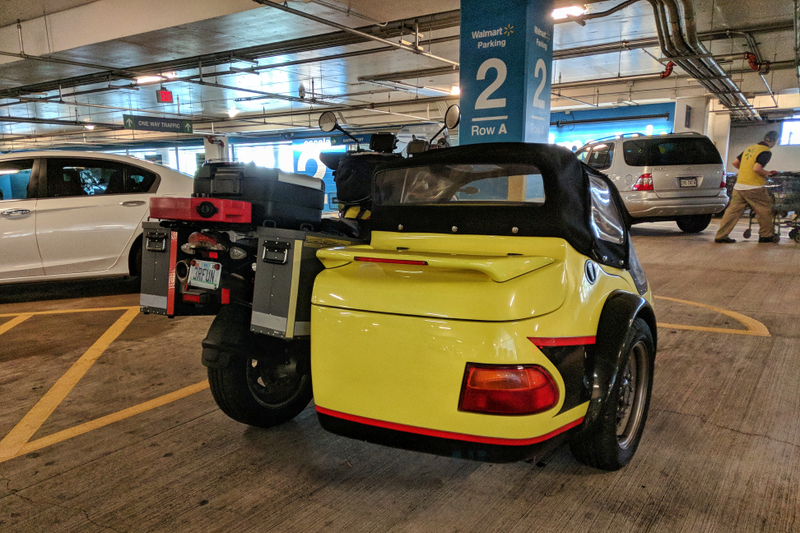 Illustration for article titled This motorcycle sidecar has an NA Miata marker light and half of a Honda EG Civic taillight